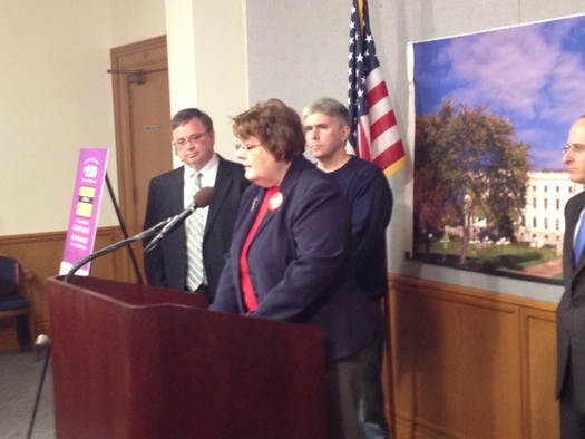 PHOTO: Peggy Hiestand-Harri and Rep. Joe Atkins at introduction of the bill to cut down on fraudulent wire transfers of money. Harri's mother was scammed out of $47,000. CREDIT: AARP MN