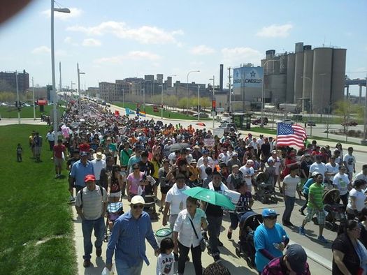 PHOTO: Much of the debate about immigration reform centers on its impact on working conditions and the job market. Photo of a pro-reform rally courtesy of Interfaith Worker Justice.