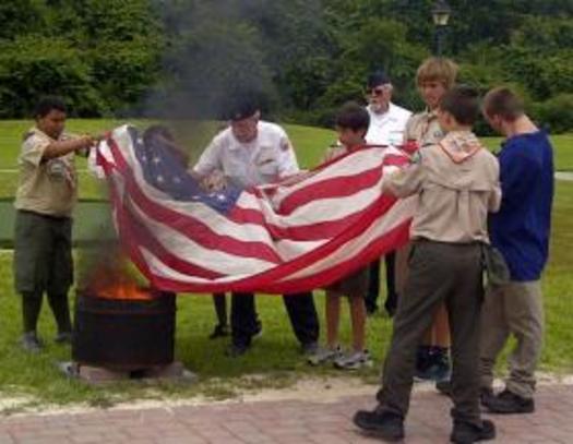 PHOTO: Boy Scout troops have flag retirement ceremonies that focus on burning worn flags with dignity. At this one, held in June in Florida, more than 50 flags were retired. Courtesy Boy Scout Troop 330, St. Augustine, Fla.