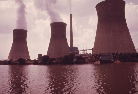 The John Amos power plant - seen in this government PHOTO from the 70s - is part of a proposed utility deal observers say has more to do with the needs of the companies involved than the needs of ratepayers.