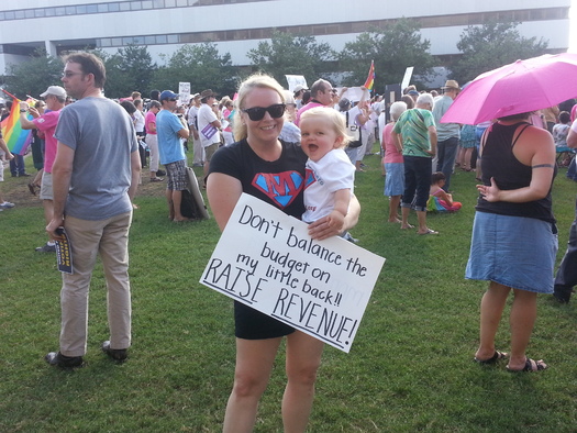 Photo: Rose-Water and her daughter at a recent Moral Monday protesting recent decisions by the State Assembly. Courtesy: Melea