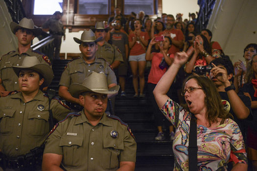 PHOTO: Texas Rangers lined the stairwells and halls of the Capitol rotunda during this month's peaceful protests against HB2. Photo by Lauren Gerson.