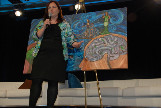 Photo: Holliday expresses her story and others through her art. Courtesy: Holliday