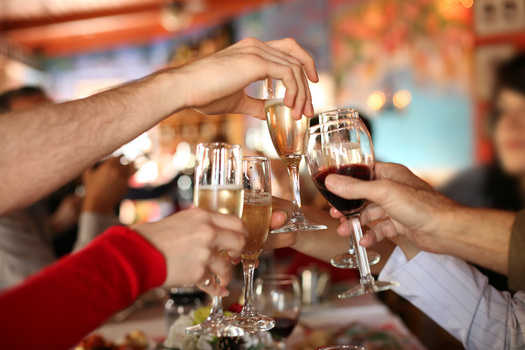 PHOTO: Would you toast if you knew that the costs associated with excessive drinking top $8 billion in Michigan in a single year  many of them borne by state government? Photo credit: Microsoft Images