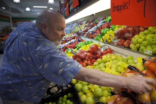 PHOTO: New data from the United States Department of Agriculture Economic Research Service indicates the continued prevalence of food insecurity in Ohio. PHOTO: Man purchasing produce. Credit: OAFB.