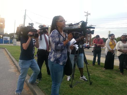 Photo: Wilson and other concerned citizens protest what they say is racial profiling by Durham Police. Courtesy: SpiritHouse