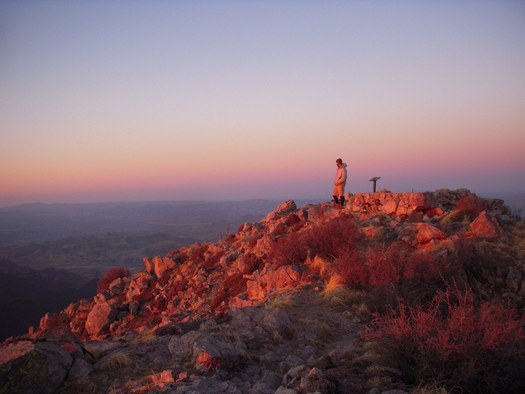 PHOTO: A lone hiker enjoys the view from Mount Wrightson Wilderness near Tucson. A photo contest is under way featuring the state's wild places. CREDIT: Sam Frank/AWC