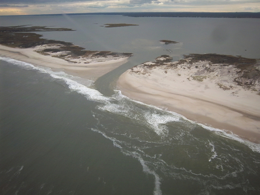PHOTO: One year ago, Superstorm Sandy cut a breach through a narrow part of Fire Island. In one of the hurricanes few silver linings, that cut resulted in slightly less damaging brown tide this summer in Great South Bay. Courtesy National Parks Service.