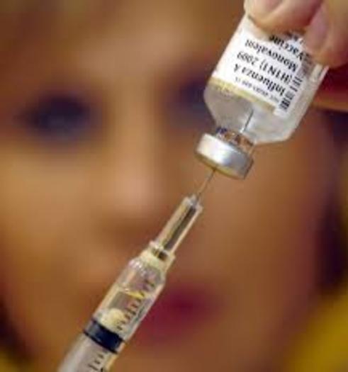 PHOTO: Health officials are urging parents to consider having their children immunized against influenza whether they have pre-existing medical conditions or not. Photo courtesy of Microsoft Images.