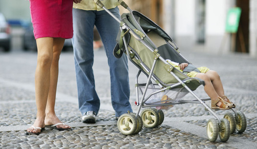 PHOTO: A Montana mother of a new baby pushed her daughter along in a 