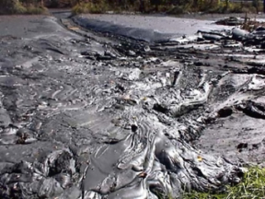 Photo: Coal ash sludge in Kingston, TN. Courtesy: cleanwateraction.org