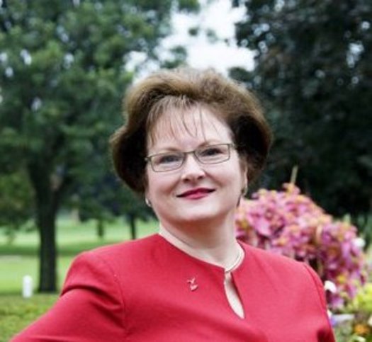 PHOTO: Janine Krolikowski proudly wears red in memory of the heart attack she survived 11 years ago, and hopes that others in Michigan will join in the fight against heart disease. Photo courtesy of Krolikowski. 