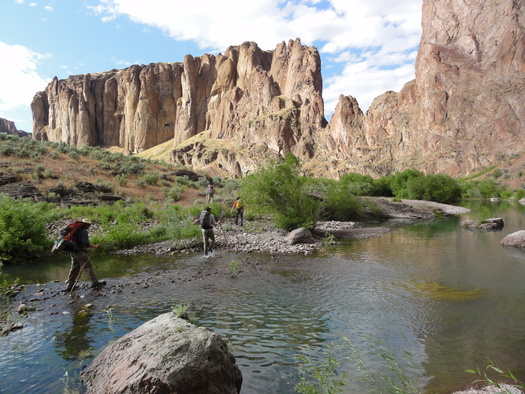 PHOTO: ONDA staff and volunteers survey a section of the Oregon Desert Trail in 2011, along the West Little Owyhee River in the Owyhee Canyonlands. Photo credit: Jeremy Fox.