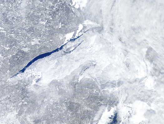 PHOTO: A satellite photo from February 14th shows Lake Superior nearly completely covered with ice. Photo credit: NOAA.
