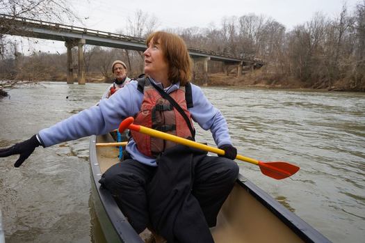 PHOTO: Jenny Edwards of the Dan River Basin Association meets with the Waterkeeper Alliance after a morning paddle past the coal-ash spill. Photo courtesy Waterkeeper Alliance