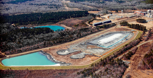 Looking northwest, the 1985 and 1978 ash ponds and the retired Cape Fear Plant. In the background, the Deep River and the Haw River combine to form the Cape Fear River near Moncure, NC. Photo Credit: Rick Dove/Waterkeeper Alliance.