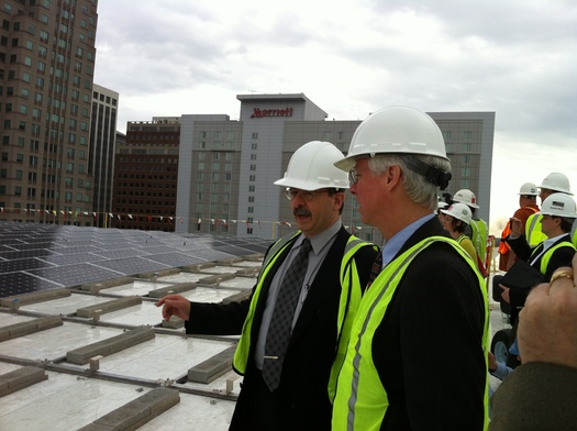 Photo: Amory Lovins of the Rocky Mountain Institute. left, and Raleigh City Councilman Russ Stephenson stand on top of Raleigh's new LEED certified Convention Center. Photo credit: Russ Stephenson