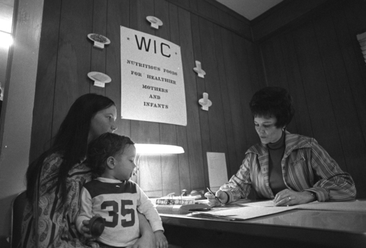 PHOTO: Since 1974, the WIC program has helped lower-income women and their young children with food assistance and nutrition education. Photo credit: National Archives and Records Administration.