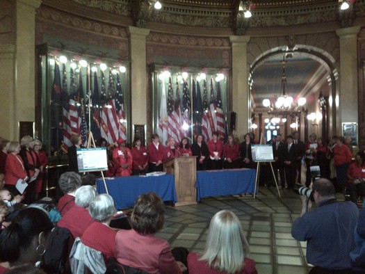 PHOTO: Supporters of equal pay legislation will again gather in the Capitol rotunda today, many wearing red to symbolize that women's paychecks are 