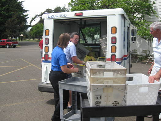 PHOTO: It takes an army of letter carriers and volunteers to pick up more than 1 million pounds of nonperishable food items expected in this weekend's Stamp Out Hunger donation drive. Photo courtesy Oregon Food Bank.