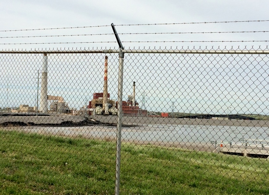 PHOTO: A Sierra Club report alleges this coal ash pond at the E.W. Brown Generating Station is contaminating surface and groundwater. Photo courtesy Alex DeSha, Sierra Club.