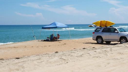 PHOTO: Cars are still allowed on 19 miles of Cape Hatteras National Seashore, but vehicles are restricted on another 11 miles of beach to preserve habitat for nesting birds and sea turtles. Photo courtesy National Park Service.