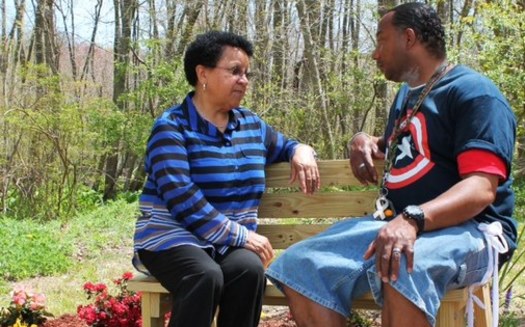 PHOTO: A young veteran consults with Suffolk County United Veterans Social Worker Roberta Sharpe. Photo courtesy Suffolk County United Veterans. 