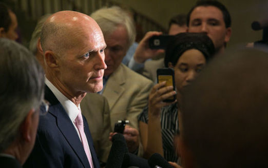 PHOTO: Gov. Rick Scott answers reporters' questions, and there are a lot of them, amid allegations of improper oversight of the Florida Department of Law Enforcement. Photo credit: Sara K. Brockmann, State of Florida/Wikimedia Commons.