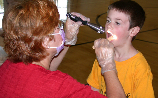 PHOTO: Getting children to brush their teeth and floss, and reminding parents of how the importance of oral health, are the goals of National Children's Dental Health Month. Photo courtesy North Carolina Department of Health and Human Services.