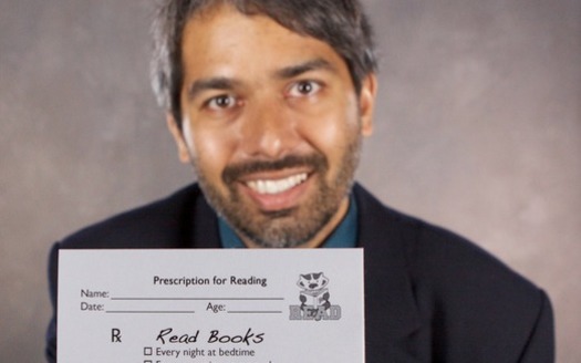 Photo: Pediatrician Dr. Dipesh Navsaria says reading is as important to child development as checkups. He is pleased that University of Wisconsin Health has provided budgetary support to expand the Reach Out And Read program to 28 locations in the UW Health system. He says books build better brains. (Photo provided by Dr. Navsaria)