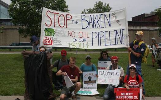 Opponents of the proposed Bakken oil pipeline says it would put the state's soil, waterways and communities at risk. Credit: Iowa Citizens for Community Improvement.