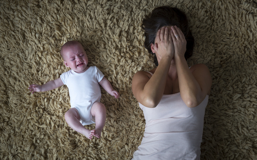 Only about 13% of U.S. mothers are guaranteed paid leave after childbirth, according to a report. Credit: SolStock.