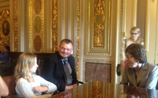 Zach Wolzich and 9-year-old daughter Samantha met with Sen. Susan Collins (R-Maine) to ask Congress to protect the carbon pollution limits in the EPA Clean Power Plan. Courtesy: Natural Resources Council of Maine