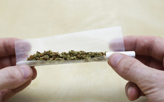 According to a new poll, 74 percent of Texas adults say the maximum punishment for being caught with marijuana should be changed from a criminal penalty to a ticket or fine. Credit: Jan Havlicek/iStockphoto.
