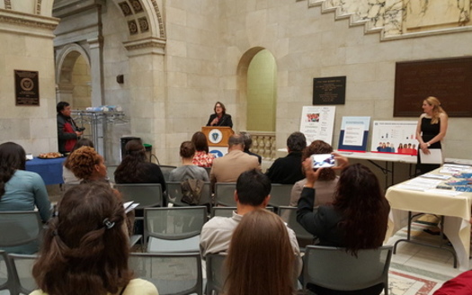 Amy Whitcomb Slemmer and other health care advocates released a new study at the State House showing many Hispanics in the Commonwealth missing out on insurance coverage. Courtesy: Health Care For All