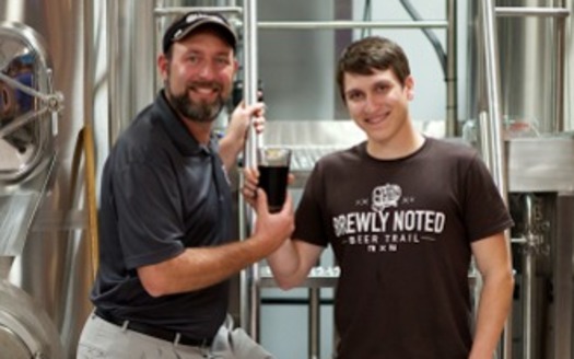 The Brewly Noted Beer Trail features nine breweries in northeast Tennessee and southwest Virginia, and encourages people to visit all breweries on the trail. Pictured here is Ken Monyak (left) of Bristol Brewery and Andrew Felty (right) of the Brewly Noted Beer Trail. Credit: Rob King