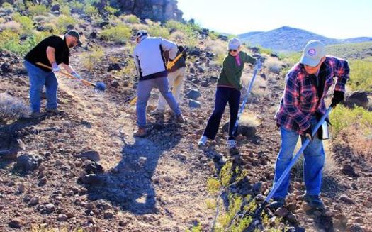 On Veterans Day, a unique partnership is providing young Nevada veterans both work and job training as part of a Veteran Conservation Corps that has been tending to Sloan Canyon. Courtesy: Friends of Sloan Canyon