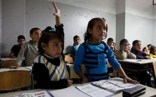 Syrian children continue to try to get an education in the midst of the conflict in their home country. Credit: UK Department for International Development/Wikimedia Commons