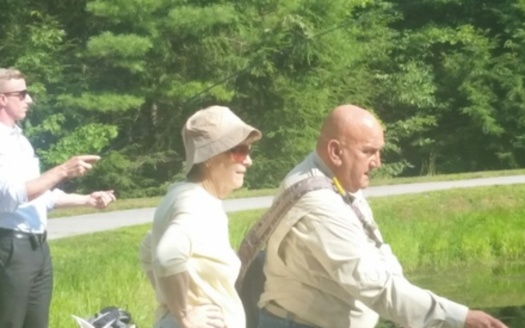 New Hampshire fishing guide Ron Sowa gives some fishing tips to Sen. Jeanne Shaheen, D-N.H. Today he is among those crediting the lawmaker for her vote this month that blocked Senate Bill 1104, which would have blocked protection of small rivers and streams. Courtesy: E. Orff.