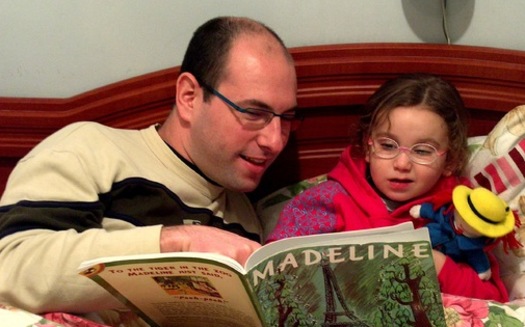 A University of Maine professor says families don't have to spend money on videos to introduce babies and young children to reading. It's as simple as sitting down with them daily to enjoy a book. (Ldorfman)