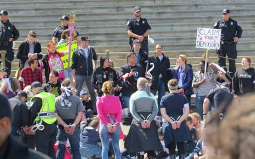A local peace activist says police in Washington, D.C., should expect to cope with even more mass arrests next week as the Democracy Spring effort combines with Democracy Awakening to put the focus on voter suppression. (NH Rebellion)