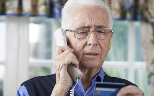 Wisconsin is getting hit with a rash of calls from scammers posing as IRS agents, demanding payment for nonexistent back taxes. (Highwaystarz Photography/iStockphoto)<br />