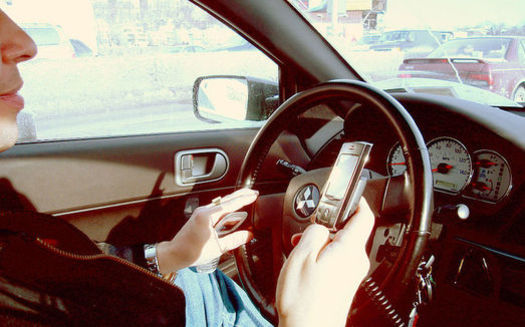 In 2014, more than 3,100 people were killed and 431,000 injured by distracted drivers. (Ed Poor/Wikimedia Commons)