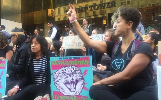 Women formed a human wall outside Trump Tower on Fifth Avenue. Similar protests were held in more than a dozen other U.S. cities. (Brigid Flaherty)