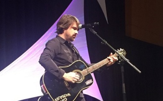 Singer and songwriter Jimmy Wayne, on stage in Indianapolis, spreads the message about the thousands of children in foster care, and what others can do to help them. (Jimmy Wayne)