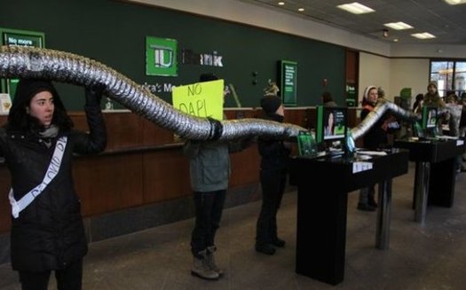 About 35 Maine students and local supporters occupied a local bank branch in Portland to protest loans the bank made to construct the Dakota Access Pipeline. (Maine Students for Climate Action) 