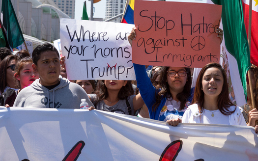 Hispanics and others protest President Trump's immigration policies while waiting for his decision on the DACA program. (shakzu/iStockphoto)