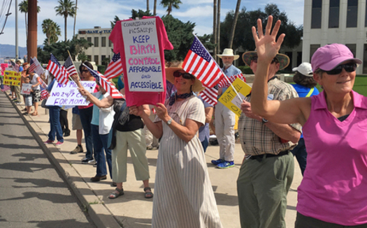 Voters rallied outside Rep. Martha McSally's office, urging the Tucson Democrat to vote against the American Health Care Act. (Dennis Newman)
