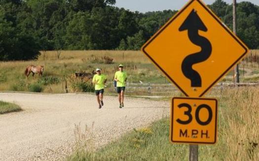 Daren Schumaker and Dennis Lee of Cedar Rapids have spent eight years running marathons in each of Iowa's counties. (Team 99 Counties)
