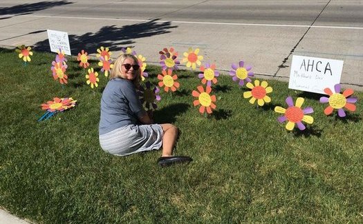 Activists planted more than 300 paper flowers outside the offices of Utah's congressional delegation yesterday, each with a testimonial from a resident concerned about the American Health Care Act. (Courtney Henderson Marden)